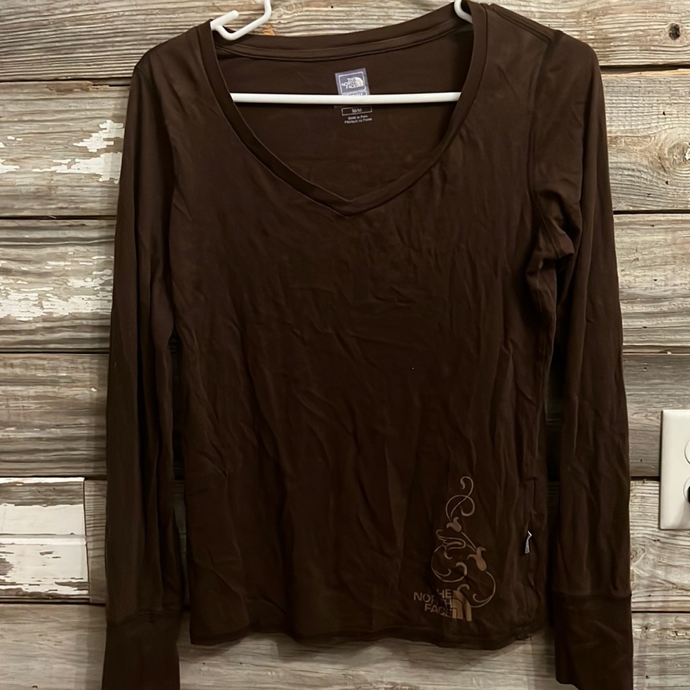 The north face long sleeve with cute bottom design